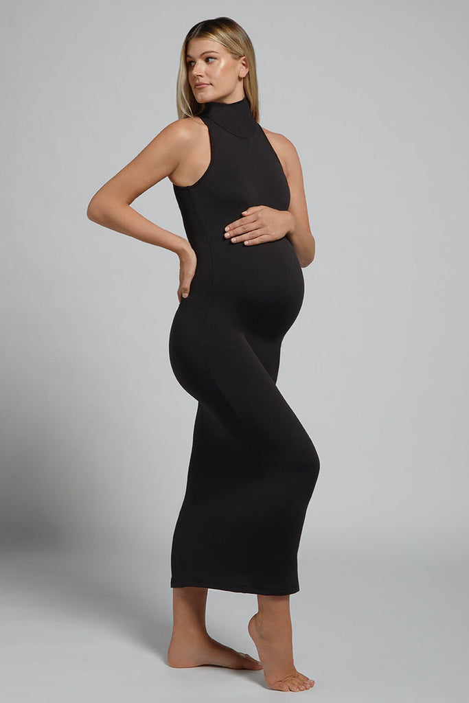 The Serena Turtleneck Maternity Sleeveless Midi Dress in Black