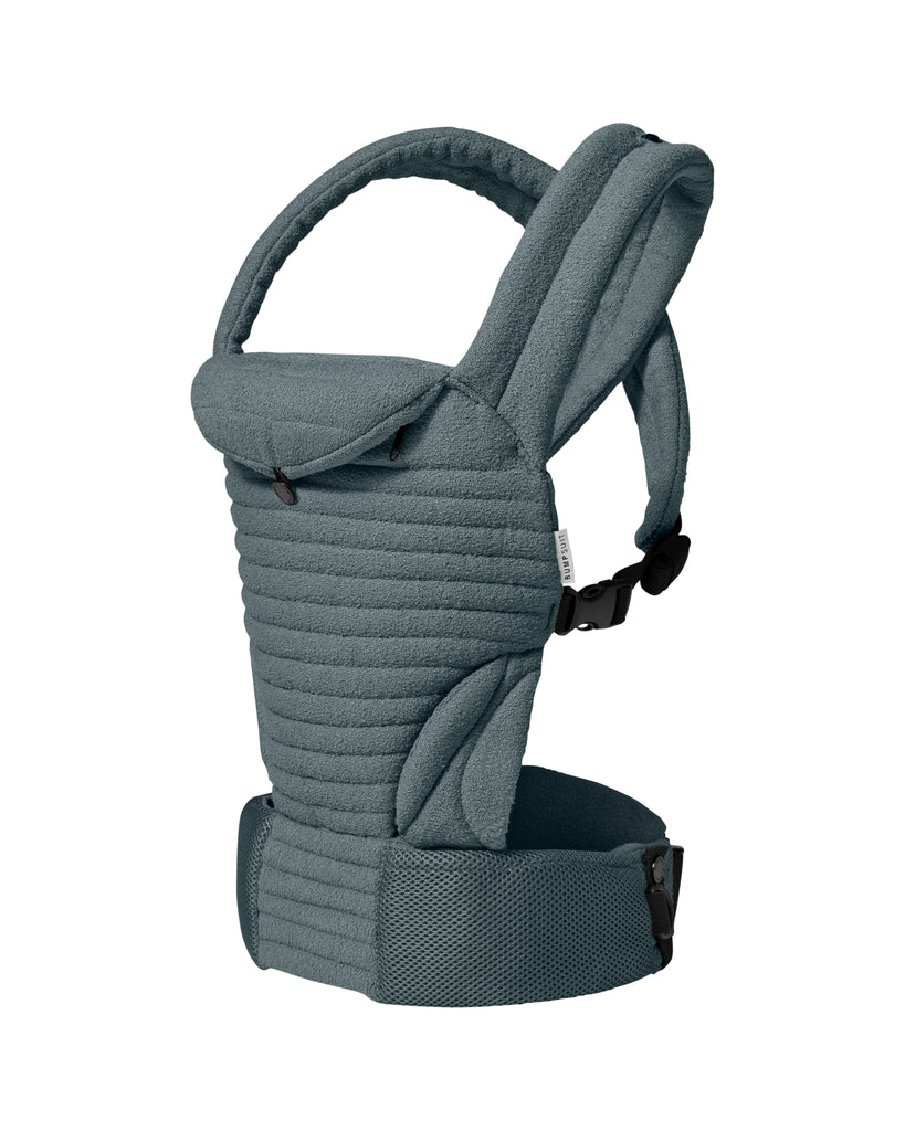 The Armadillo Baby Carrier in Lou Blue worn by Rumer Willis