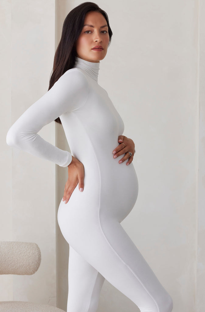Bumpsuit Maternity the penelope turtleneck long sleeve jumpsuit in ivory