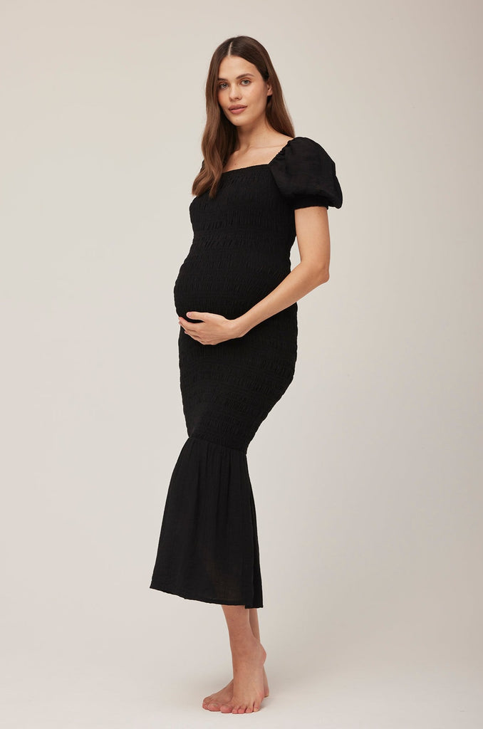 Bumpsuit Maternity Vacation Collection feat. Georgia Fowler the Shirred Puff Sleeve Dress in Black