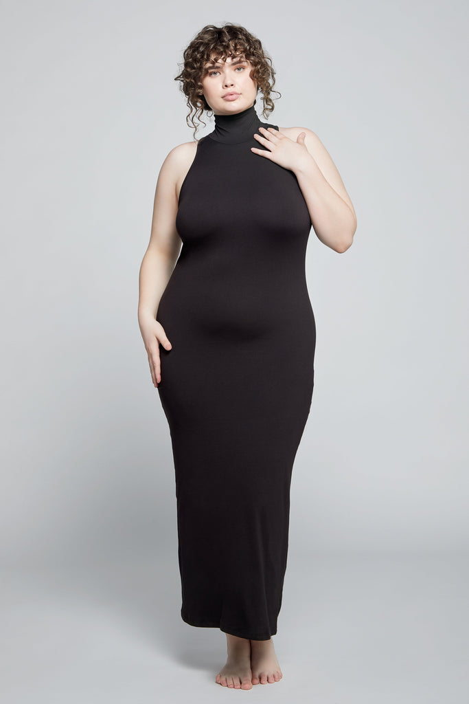 The Serena Turtleneck Maternity Sleeveless Midi Dress in Black