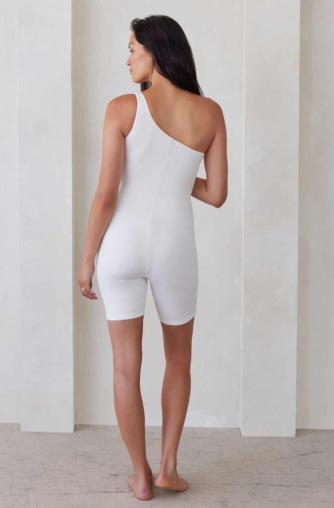 The Romee One Shoulder Maternity Bumpsuit in Ivory